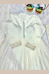 Close-up of heavy embroidery work on gown