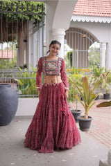 Faux Georgette Navratri Lehenga Choli with decorative Dori Latkan closure.