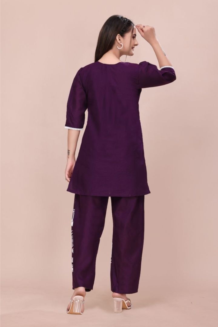 Back view of elegant slub cotton embroidered cord set for women with coordinated design.