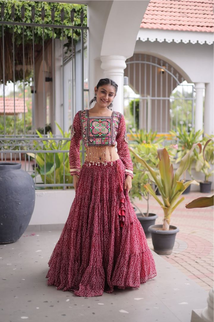 Faux Georgette Navratri Lehenga Choli with decorative Dori Latkan closure.