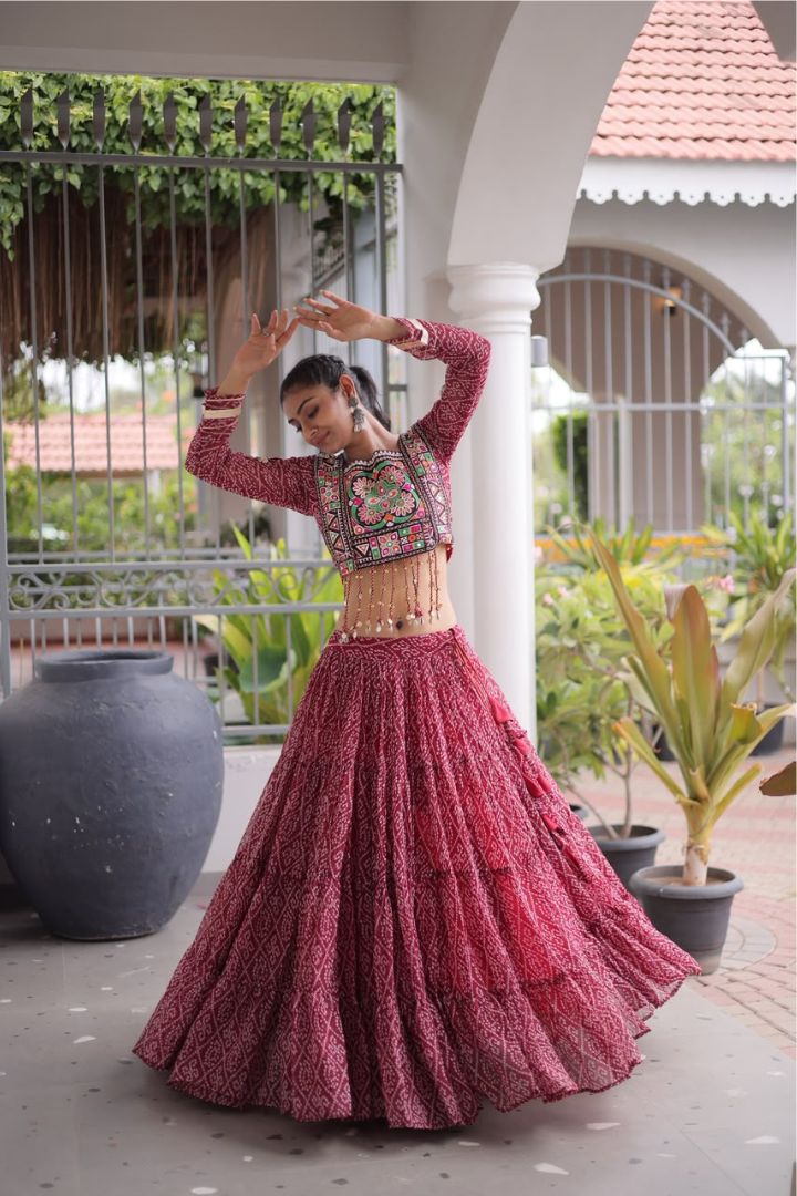 Elegant Kutchi Patchwork blouse paired with Bandhani Print Lehenga Choli.